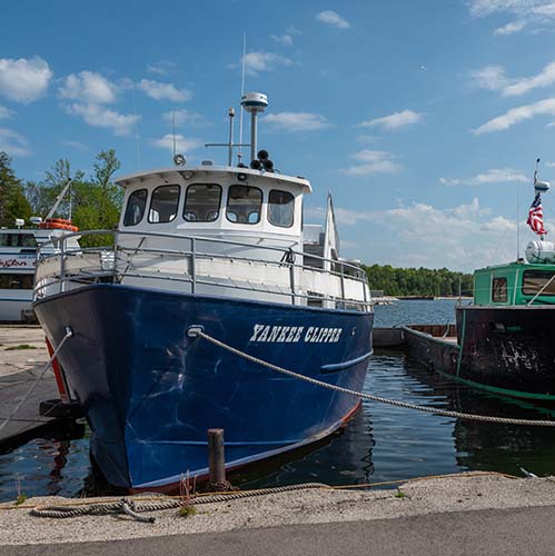 A boat docked in a marina.